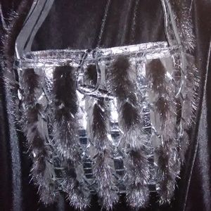 Nancy Gonzelez mink /crocodile bag